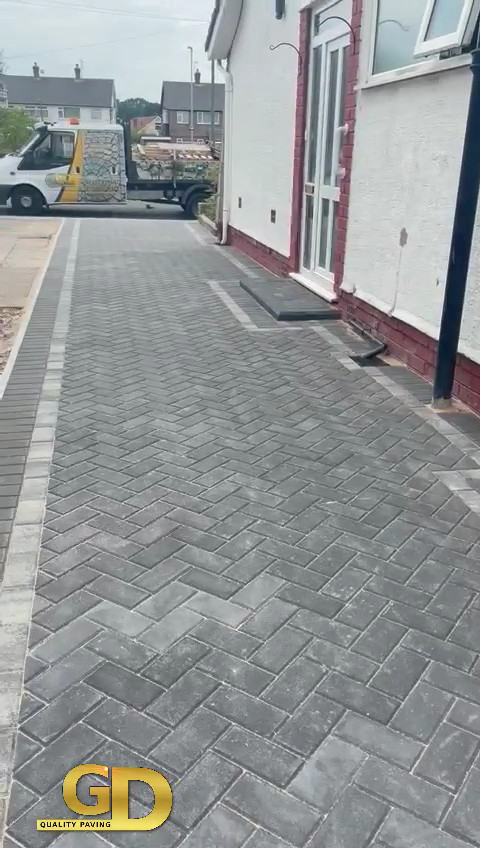 Grey block with light grey border driveway in Parkgate, The Wirral, Cheshire.